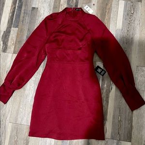 Red dress, new, I'm selling it because when I tried was too tight.